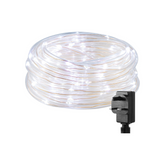 Coiled LED light strip with plug on a white background